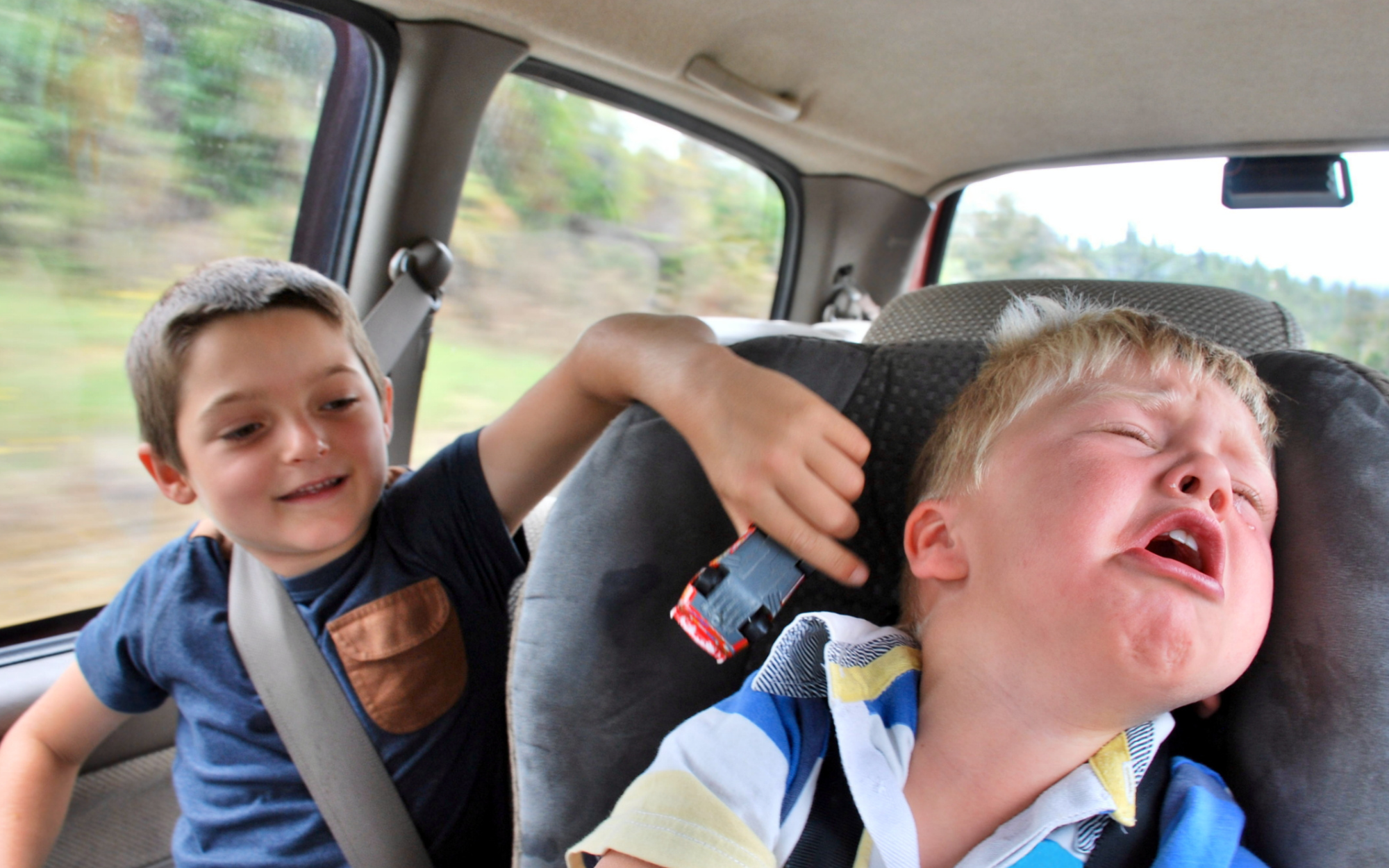 Keeping Children Safe & Entertained on Long Car Journeys